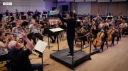 Melvin Tay conducting the BBC Philharmonic Orchestra